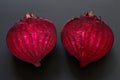 Two parts raw Ã¢â¬â¹Ã¢â¬â¹beetroot on black background Royalty Free Stock Photo